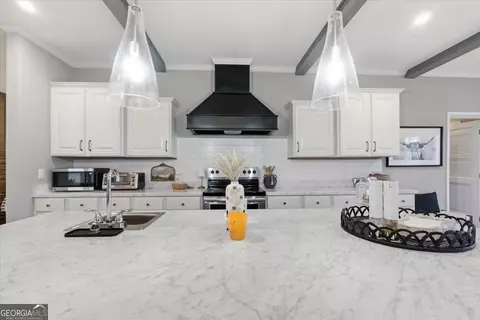 Kitchen - 635 Snow Granade Rd, Gordon, GA 31031 photo 2 of 4