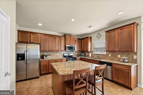 Kitchen - 108 Christopher Michael Ln, Hampton, GA 30228 photo 2 of 4