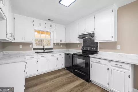 Kitchen - 243 Malcom Rd, Covington, GA 30014 photo 1 of 2