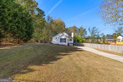 Exterior - 1229 N Hampton Dr, Hampton, GA 30228 photo 4 of 9