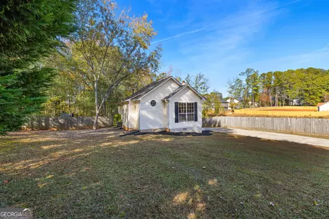 Exterior - 1229 N Hampton Dr, Hampton, GA 30228 photo 3 of 9