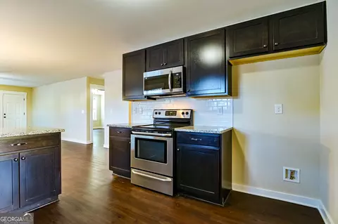 Kitchen - 330 Eagles Pkwy, Covington, GA 30014 photo 2 of 3