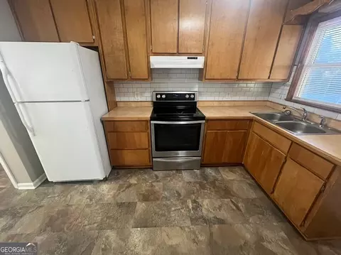 Kitchen - 4105 Rose Ln NE, Covington, GA 30014 photo 4 of 5