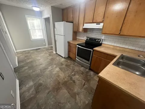 Kitchen - 4105 Rose Ln NE, Covington, GA 30014 photo 5 of 5