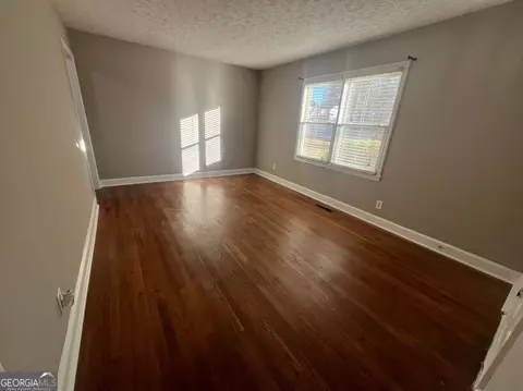 Living - 4105 Rose Ln NE, Covington, GA 30014 photo 2 of 4