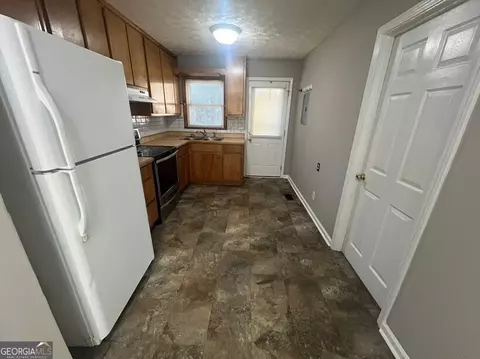 Kitchen - 4105 Rose Ln NE, Covington, GA 30014 photo 2 of 5