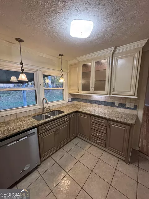 Kitchen - 228 Sivell Rd, Lagrange, GA 30241 photo 8 of 14