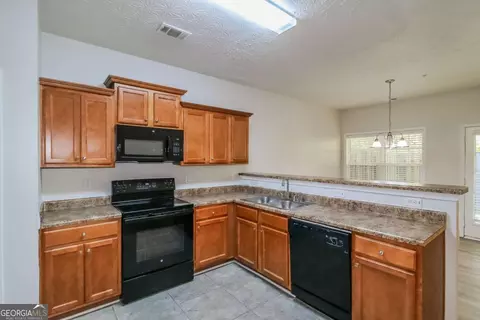 Kitchen - 3824 Augustine Pl, Rex, GA 30273 photo 2 of 2