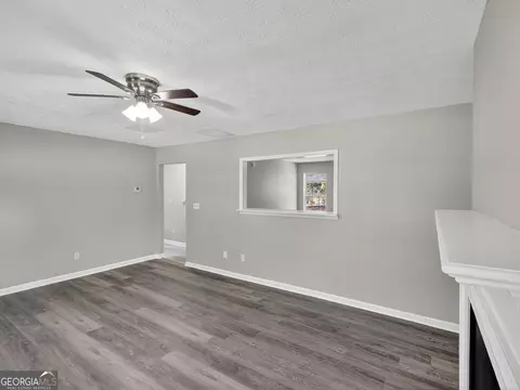 Living - 3787 Rolling Pl, Conley, GA 30288 photo 3 of 4
