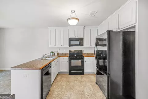Kitchen - 172 Settle St, Winder, GA 30680 photo 3 of 3