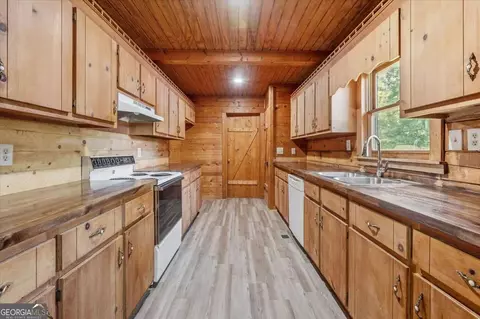 Kitchen - 910 Brushtown Rd, Cisco, GA 30708 photo 2 of 3