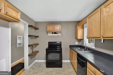 Kitchen - 113 Maple St, Bremen, GA 30110 photo 1 of 2