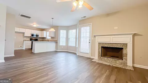 Living - 1106 Oak Hollow Ln, Hampton, GA 30228 photo 1 of 4