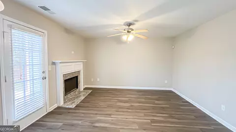 Living - 1106 Oak Hollow Ln, Hampton, GA 30228 photo 3 of 4