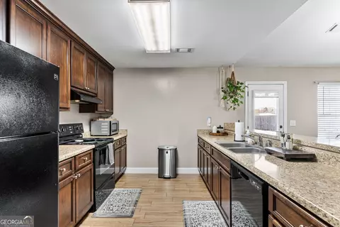 Kitchen - 152 Mathews Rd, Milner, GA 30257 photo 2 of 4