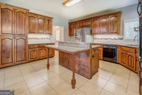 Kitchen - 353 Crowell Rd N, Covington, GA 30014 photo 1 of 9