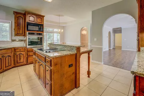 Kitchen - 353 Crowell Rd N, Covington, GA 30014 photo 2 of 9