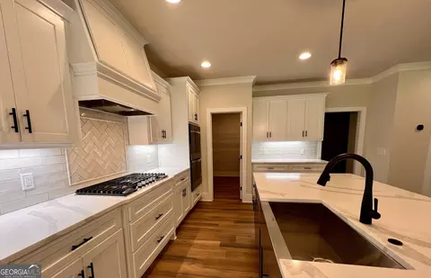 Kitchen - 865 Elder Dr, Jefferson, GA 30549 photo 14 of 15