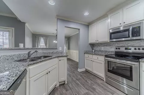 Kitchen - 149 Peak Ct, Winder, GA 30680 photo 2 of 2