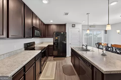 Kitchen - 107 Dasher Dr, Springfield, GA 31329 photo 5 of 6