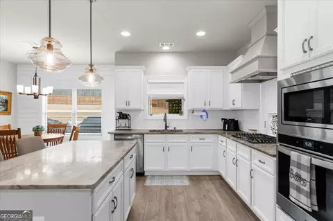 Kitchen - 182 Bella Dr, Monroe, GA 30655 photo 5 of 8