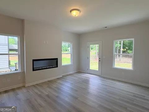 Living - 1428 Trellis Ct #( 23), Hampton, GA 30228 photo 2 of 2