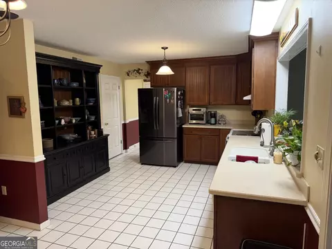 Kitchen - 223 Trinity Rd, Dublin, GA 31021 photo 2 of 3