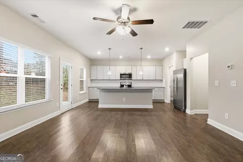 Living - 423 Pearson Cir, Hampton, GA 30228 photo 2 of 2