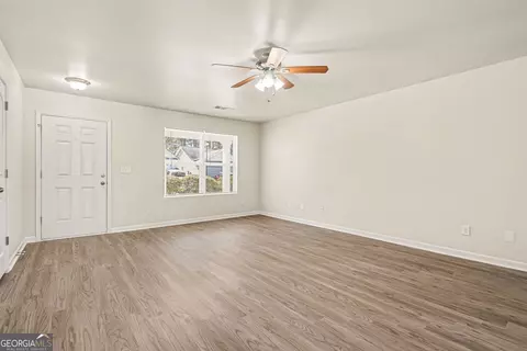 Living - 85 Bellerive Ln SE, Covington, GA 30014 photo 3 of 8