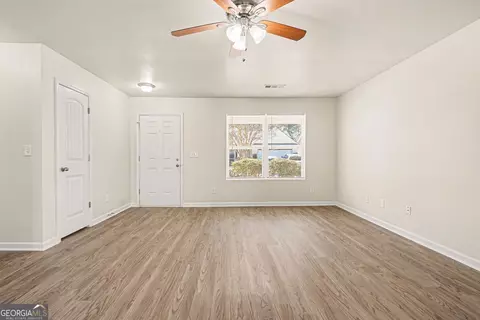 Living - 85 Bellerive Ln SE, Covington, GA 30014 photo 2 of 8