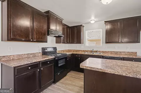 Kitchen - 85 Bellerive Ln SE, Covington, GA 30014 photo 3 of 5