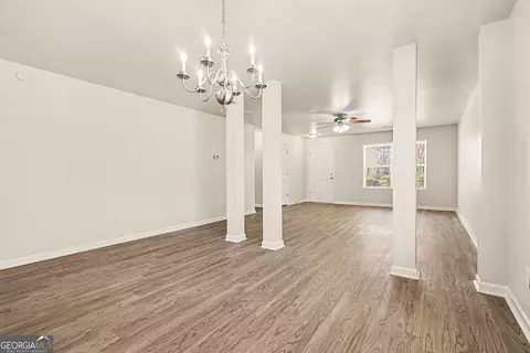 Living - 85 Bellerive Ln SE, Covington, GA 30014 photo 6 of 8