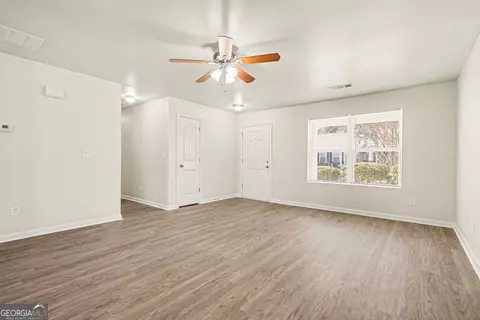 Living - 85 Bellerive Ln SE, Covington, GA 30014 photo 1 of 8