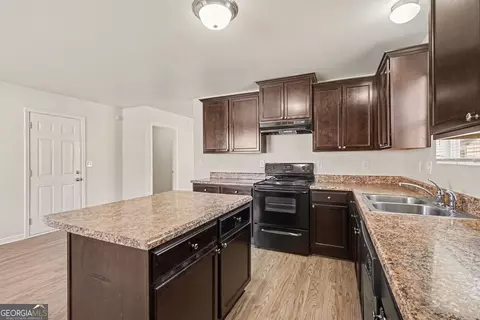 Kitchen - 85 Bellerive Ln SE, Covington, GA 30014 photo 5 of 5