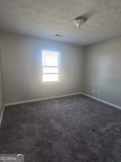 Bedroom - 25 Georgia Ave, Hampton, GA 30228 photo 2 of 2