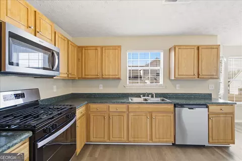Kitchen - 705 Compton Ln, Mcdonough, GA 30253 photo 2 of 3