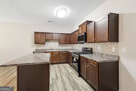 Kitchen - 155 Pine Ridge Rd, Covington, GA 30016 photo 1 of 2