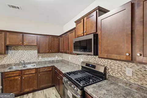 Kitchen - 155 Pine Ridge Rd, Covington, GA 30016 photo 2 of 2