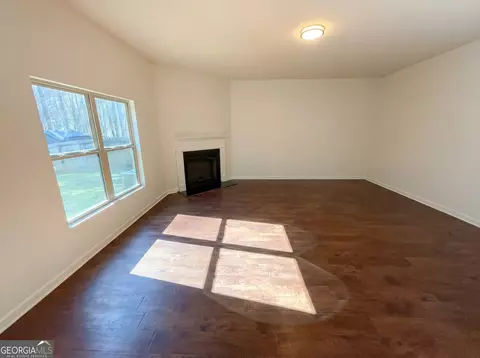 Living - 1209 Vienna Ct, Hampton, GA 30228 photo 3 of 3