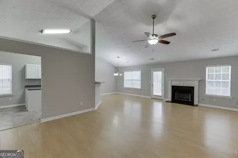 Living - 3561 Bogan Mill Rd, Buford, GA 30519 photo 1 of 7