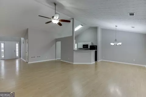 Living - 3561 Bogan Mill Rd, Buford, GA 30519 photo 4 of 7