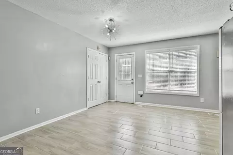 Living - 1209 N Hampton Dr, Hampton, GA 30228 photo 4 of 4