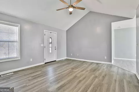 Living - 1209 N Hampton Dr, Hampton, GA 30228 photo 2 of 4