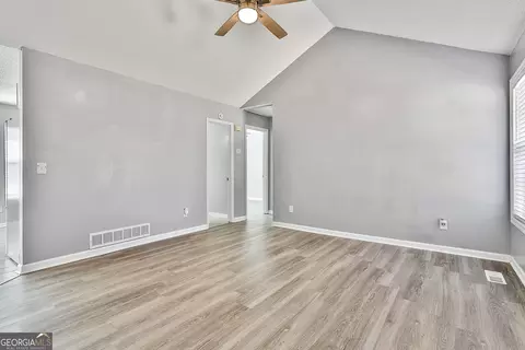 Living - 1209 N Hampton Dr, Hampton, GA 30228 photo 1 of 4