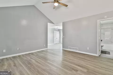 Living - 1209 N Hampton Dr, Hampton, GA 30228 photo 3 of 4