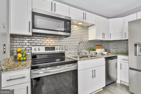 Kitchen - 1209 N Hampton Dr, Hampton, GA 30228 photo 3 of 3