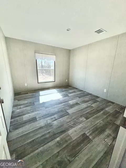 Bedroom - 420 Mosley Bridge Rd, Claxton, GA 30417 photo 2 of 2