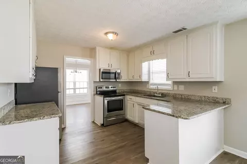 Kitchen - 80 E Lawn Dr, Covington, GA 30016 photo 2 of 2