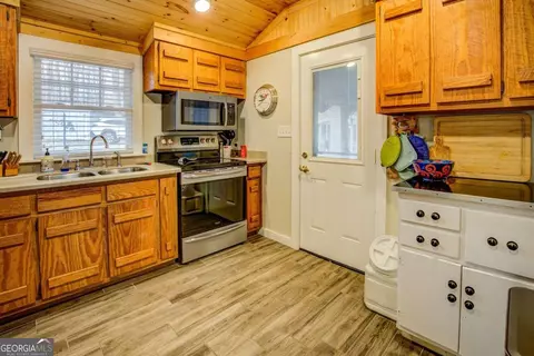 Kitchen - 500 Lang Rd, Covington, GA 30014 photo 1 of 2