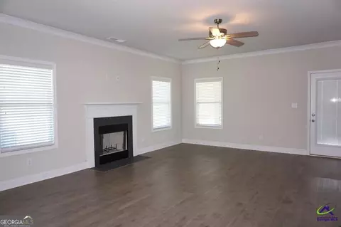Living - 121 Bluecoat Trl, Byron, GA 31008 photo 5 of 7